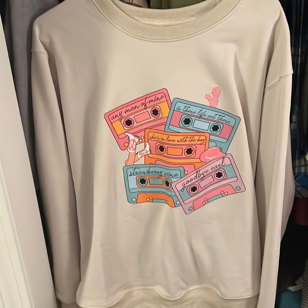the coolest sweatshirt. It is brand new and has never been worn. 100% cotton